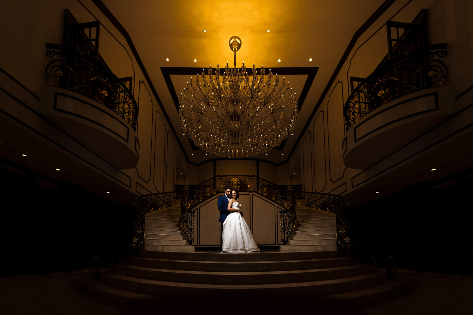 Indian wedding couple in a dramatic foyer in new york